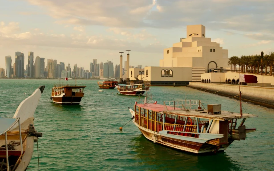 Traditional dhow boats near the Museum of Islamic Art in Doha, Qatar